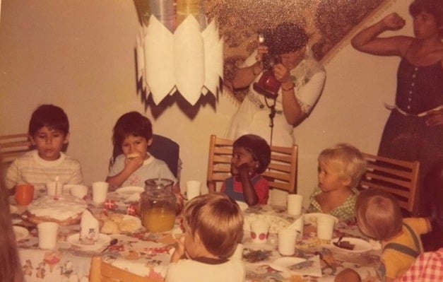 Esben (in green) at a birthday party in the Philippines around the time of his first robot